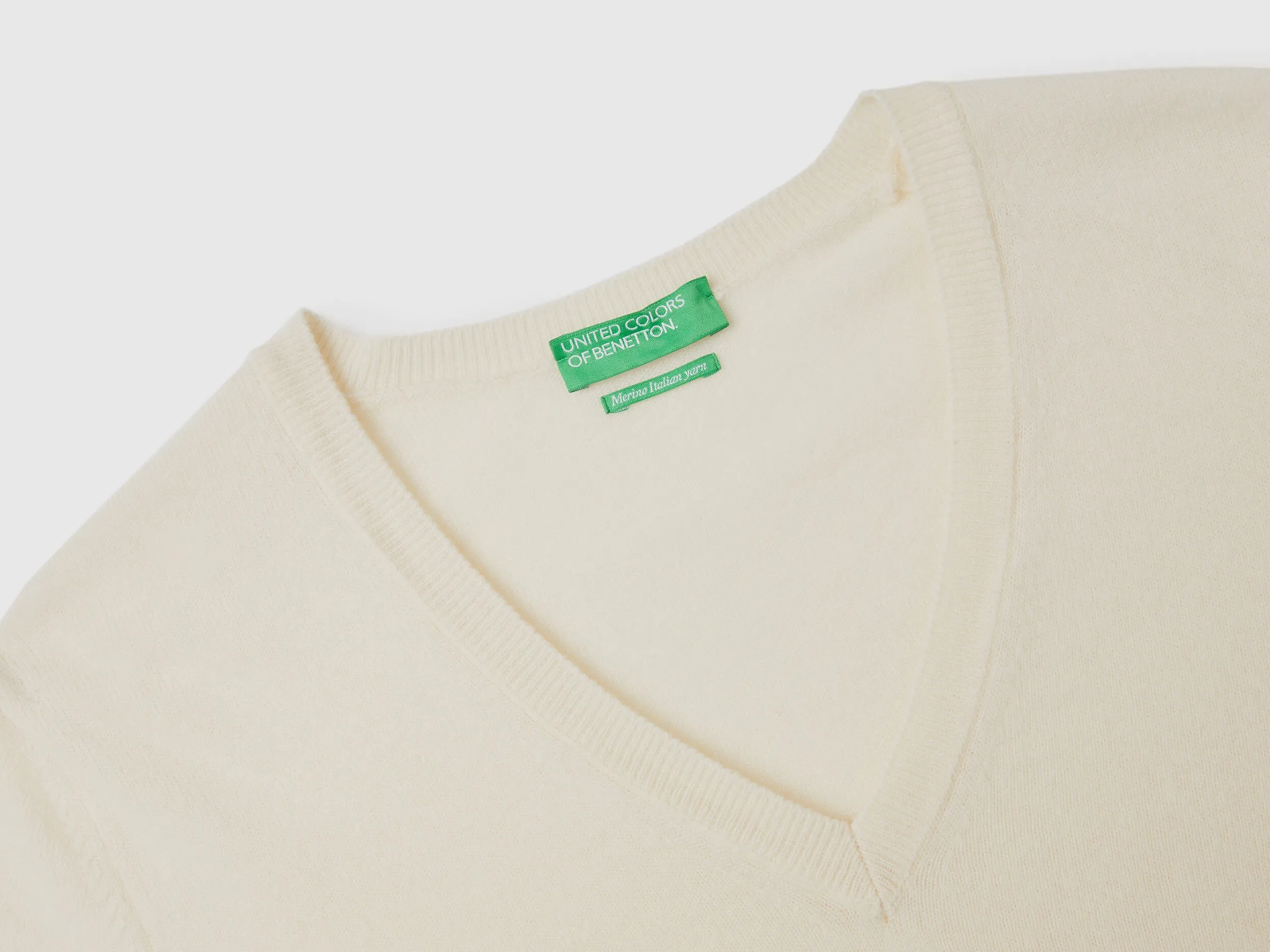 Cream V-neck sweater in pure Merino wool - Creamy White | Benetton