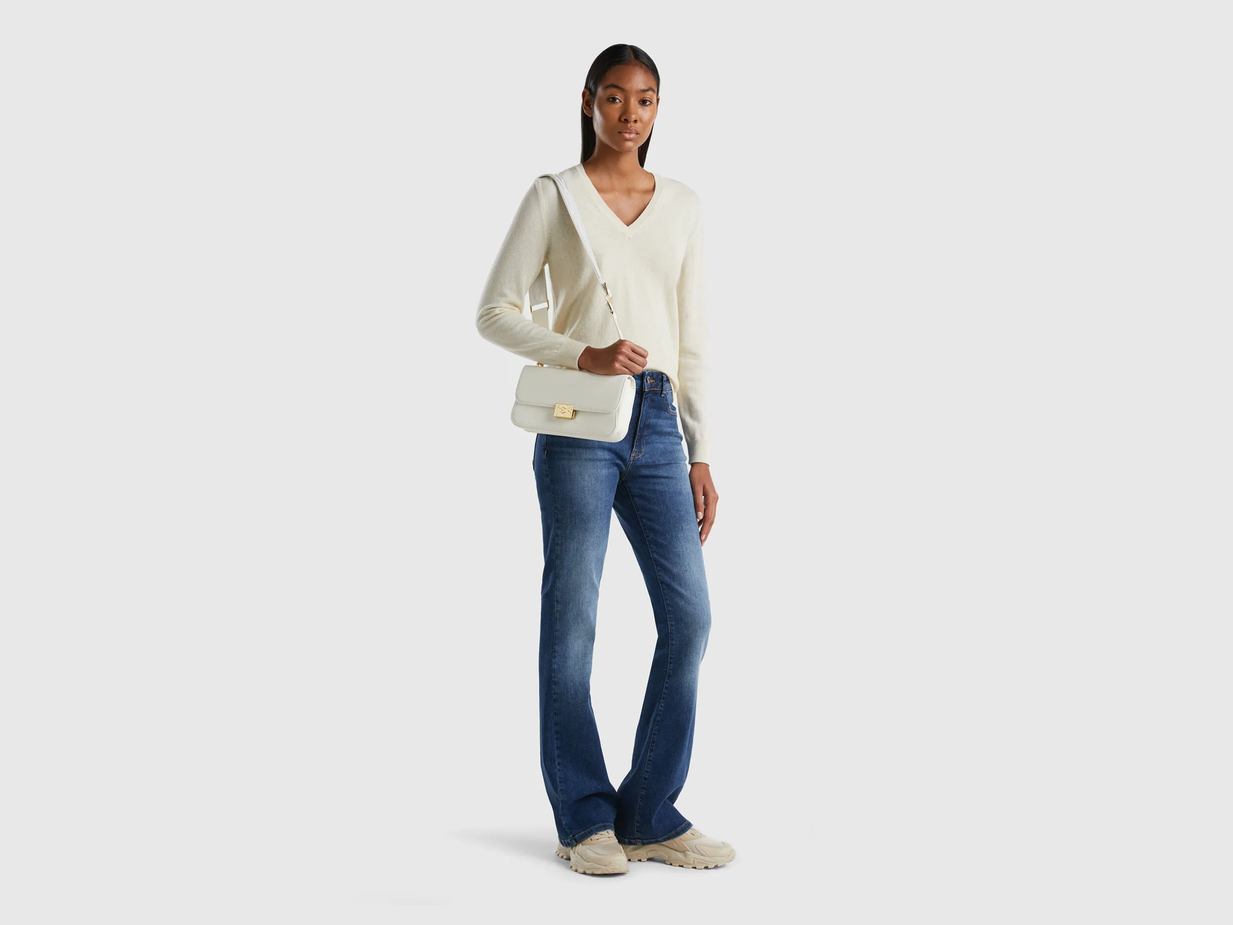 Cream V-neck sweater in pure Merino wool - Creamy White | Benetton