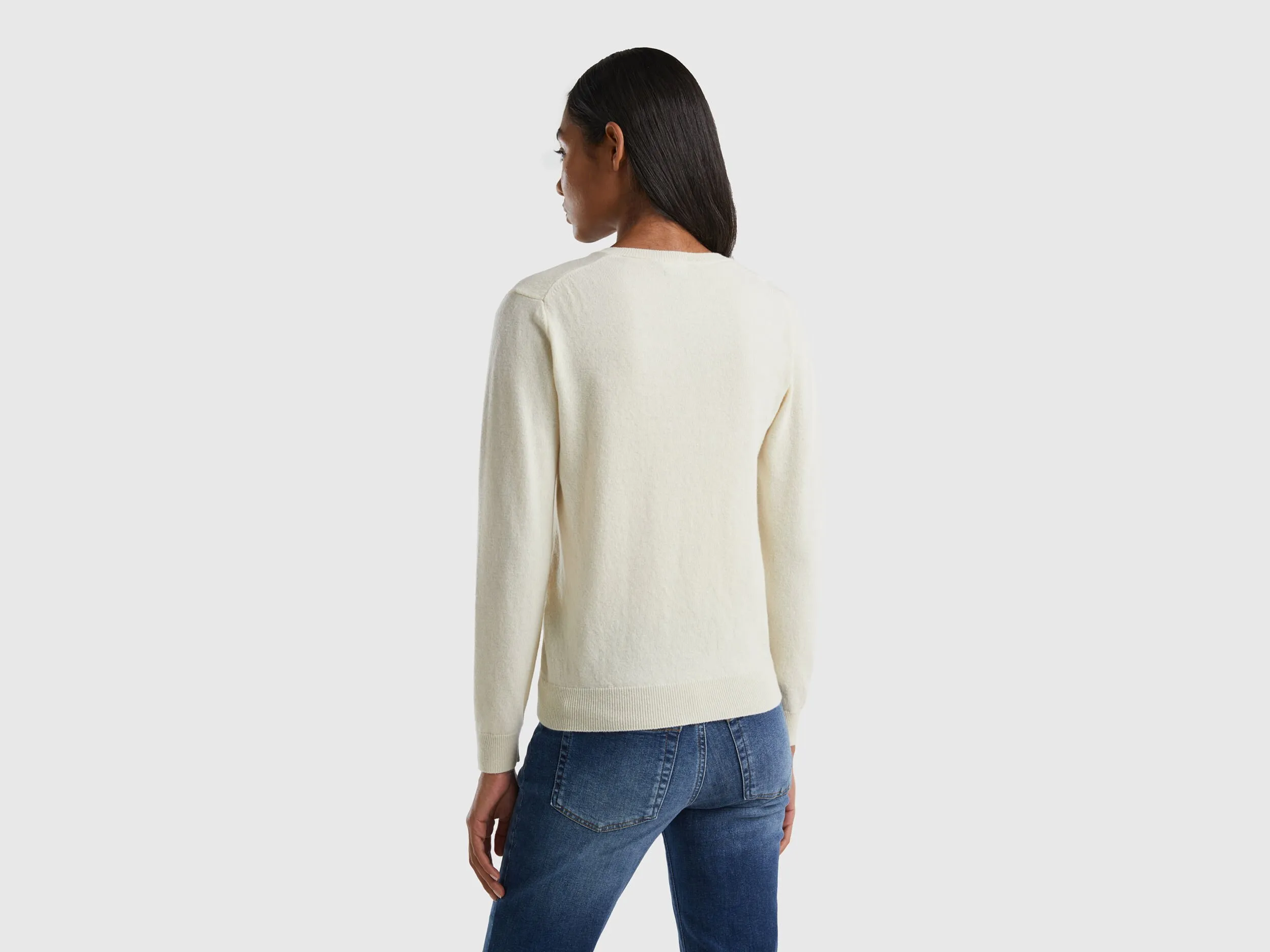 Cream V-neck sweater in pure Merino wool - Creamy White | Benetton