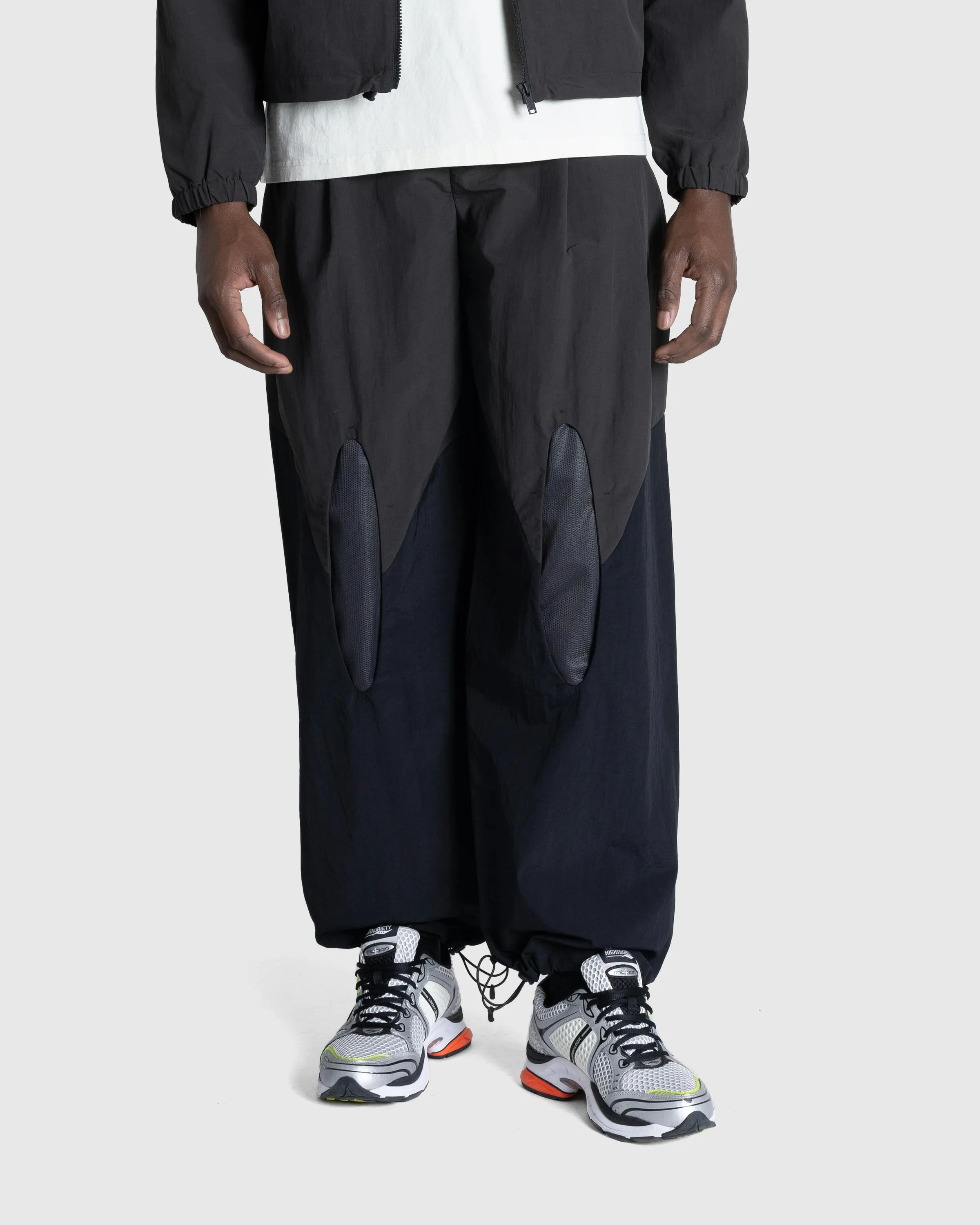 _J.L-A.L_ – Aperture Trackpant Black/Dark Green | Highsnobiety Shop