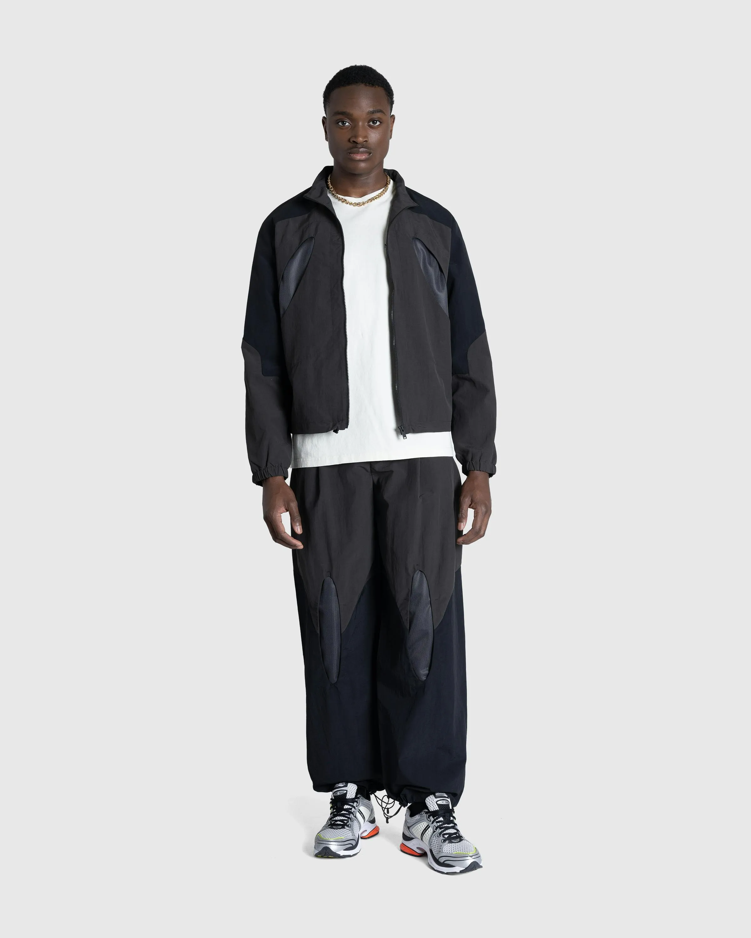 _J.L-A.L_ – Aperture Trackpant Black/Dark Green | Highsnobiety Shop