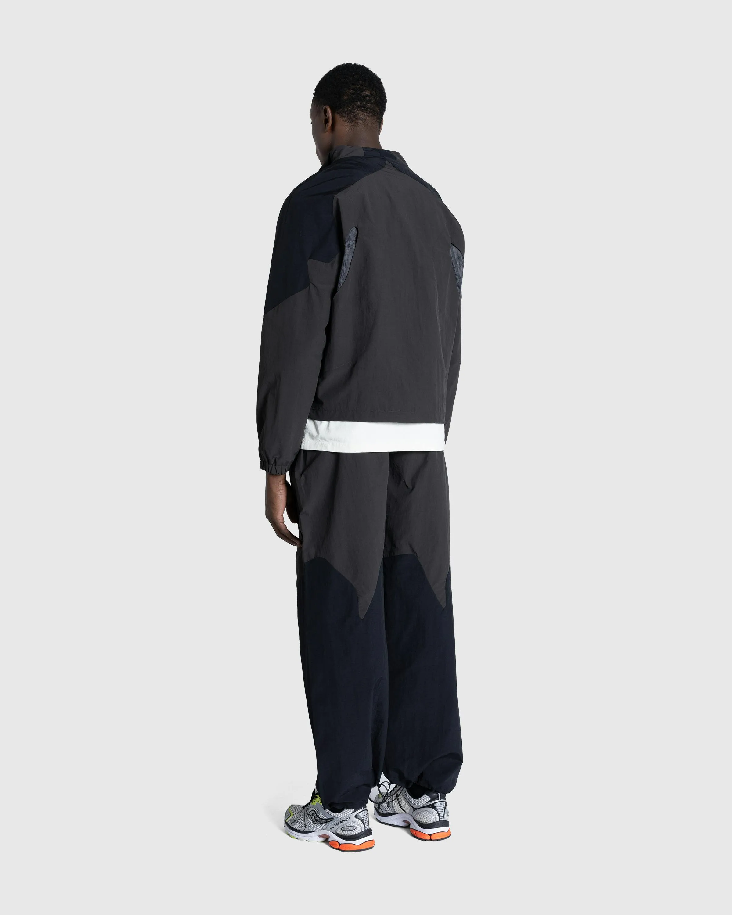 _J.L-A.L_ – Aperture Trackpant Black/Dark Green | Highsnobiety Shop