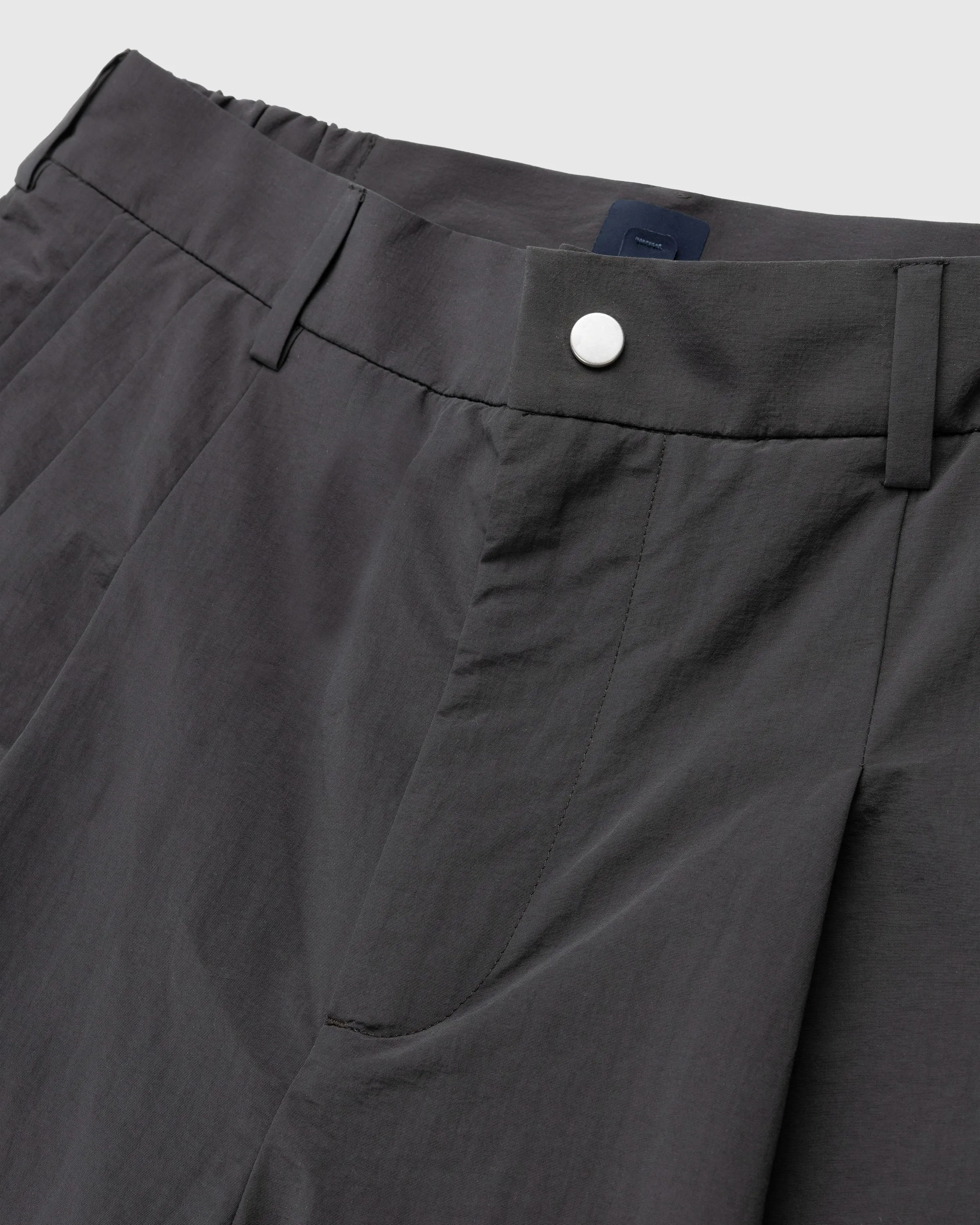 _J.L-A.L_ – Aperture Trackpant Black/Dark Green | Highsnobiety Shop